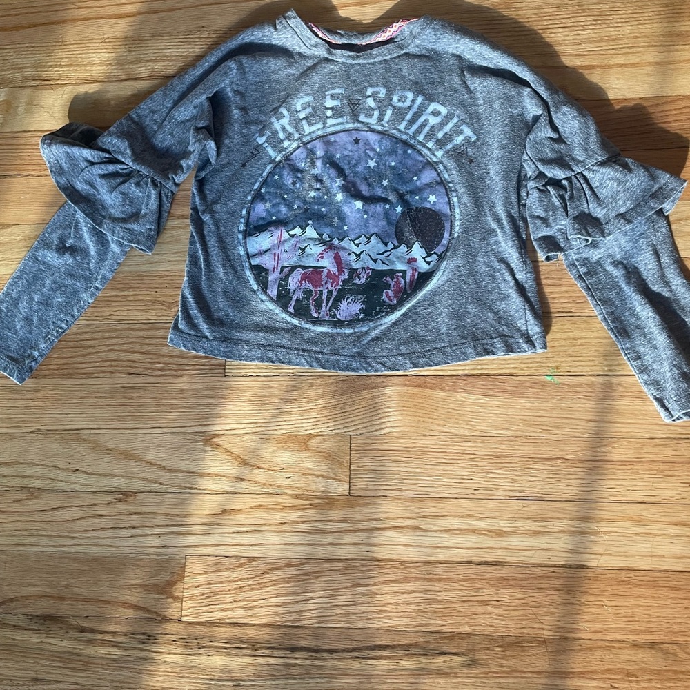 this is a grey long sleeved shirt and the brand is art class.